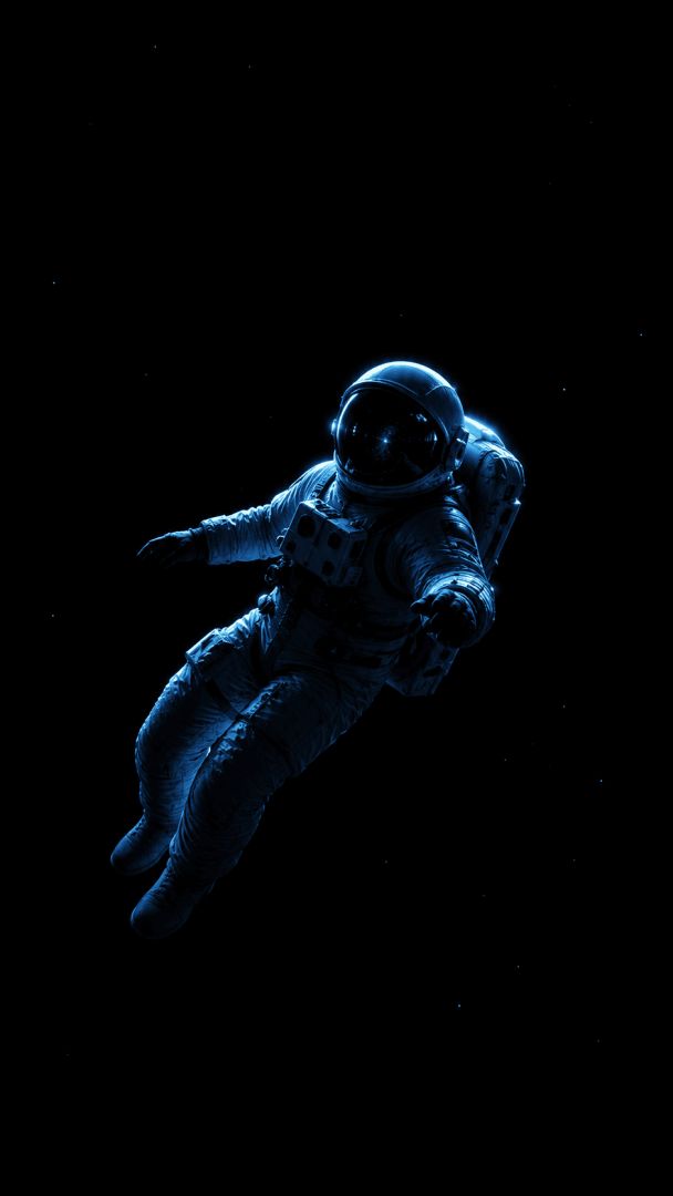 Astronaut drifting in black space wallpaper