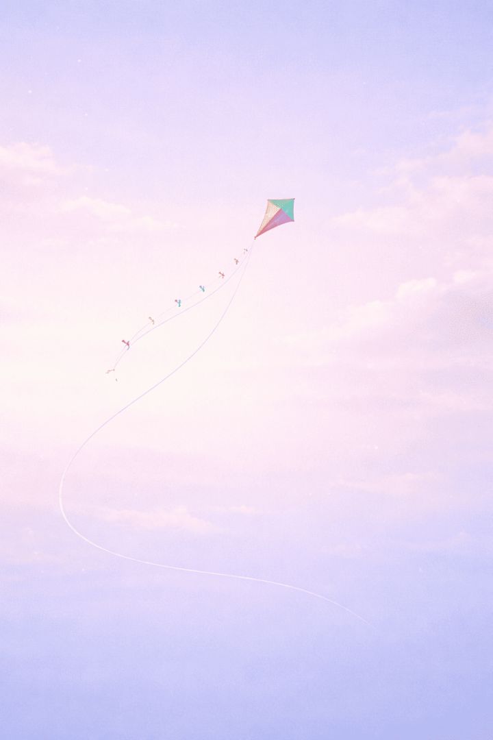 Colorful kite in a pastel sky wallpaper