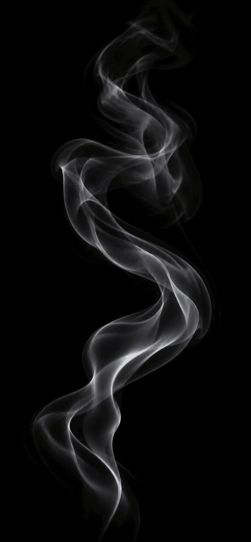 Ethereal smoke against black backdrop wallpaper