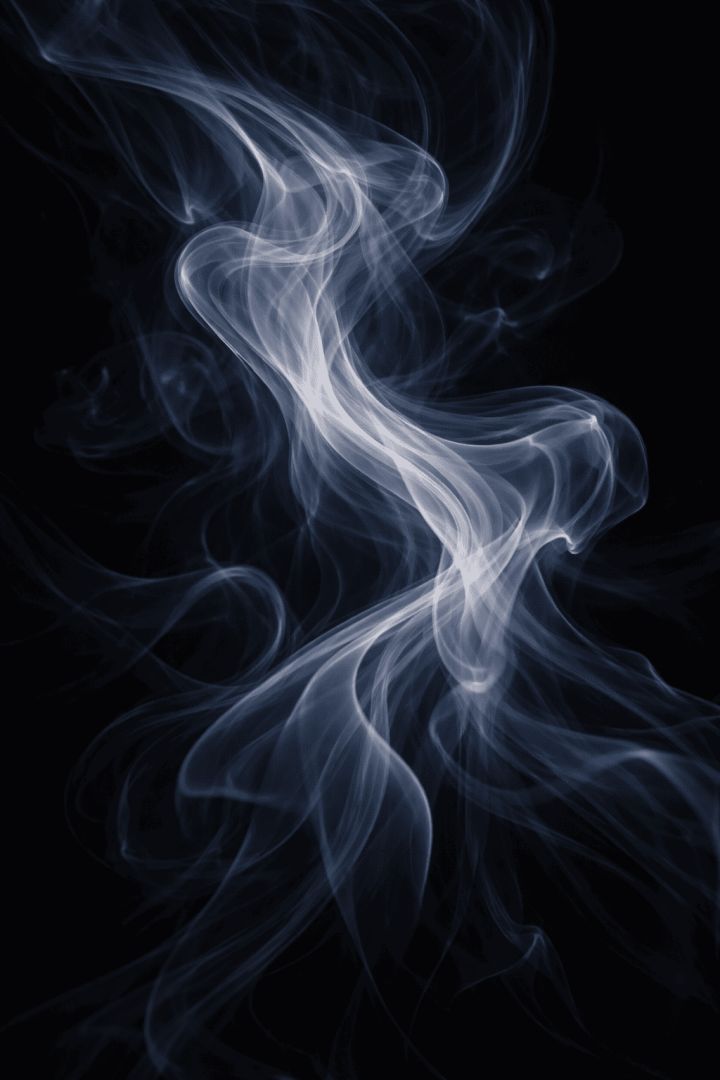Ethereal smoke on a dark backdrop abstract wallpaper