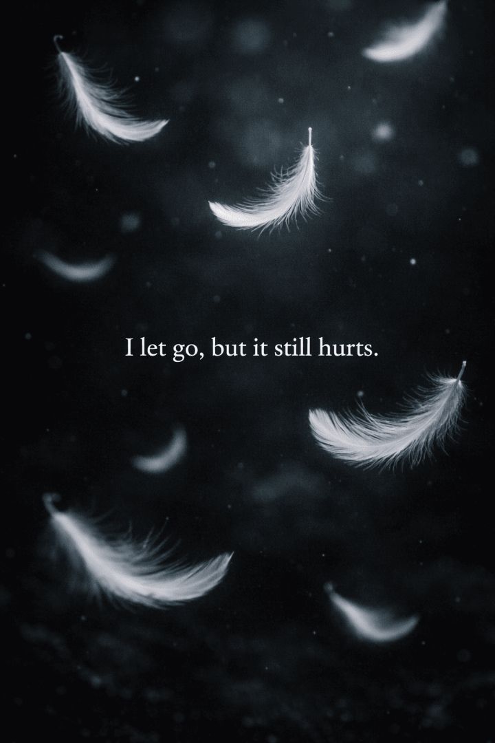 Falling feathers in a dark sky wallpaper