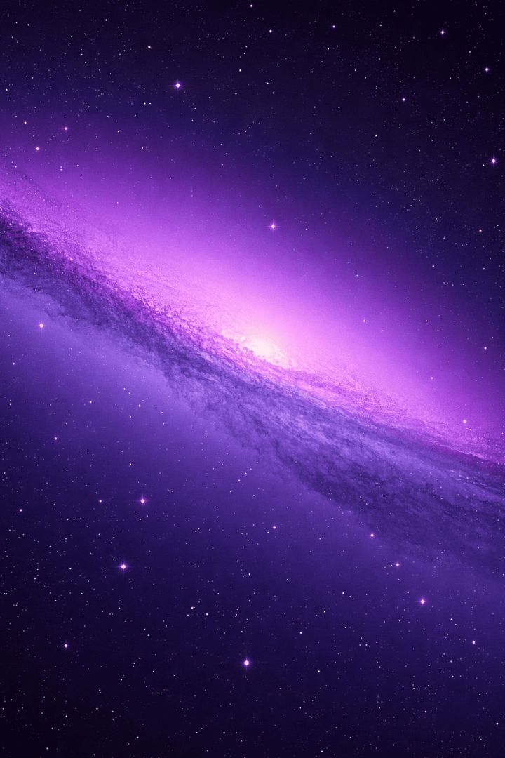 Galactic spiral under cosmic glow space wallpaper