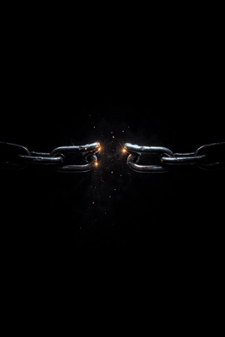 Glowing break in the chain wallpaper