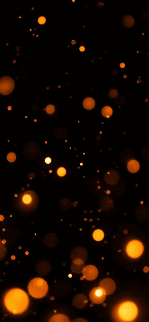 Glowing embers in dark haze wallpaper