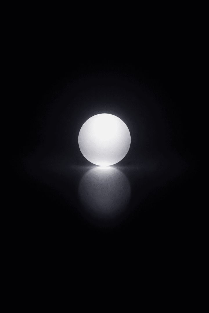Glowing orb in the void wallpaper