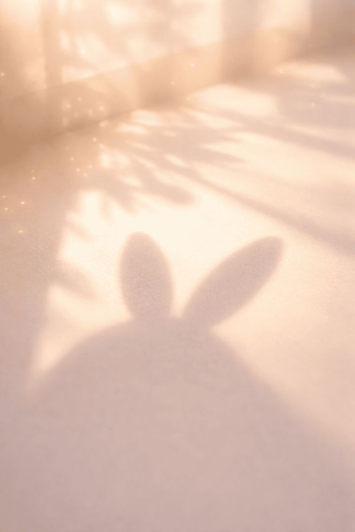 Golden bunny ear shadows in sunlight wallpaper