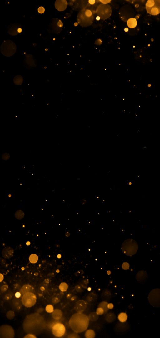 Golden dust in dark void wallpaper