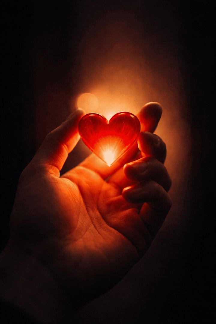Soft glow of a heart's embrace wallpaper