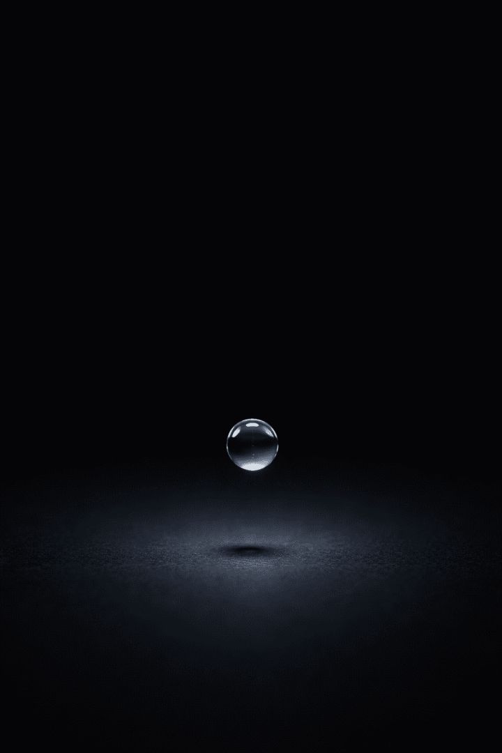 Suspended in a drop of light wallpaper
